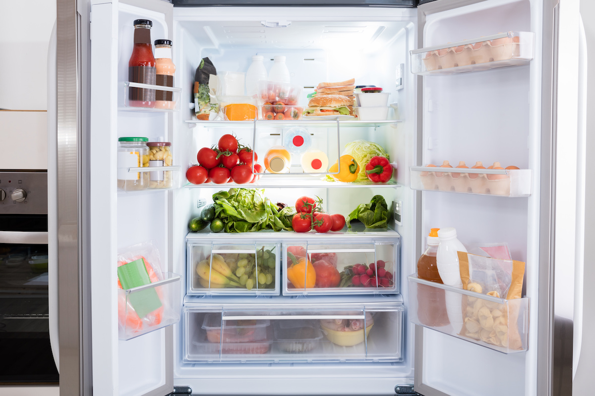 refrigerator repair experts in a look at the inside of a fridge