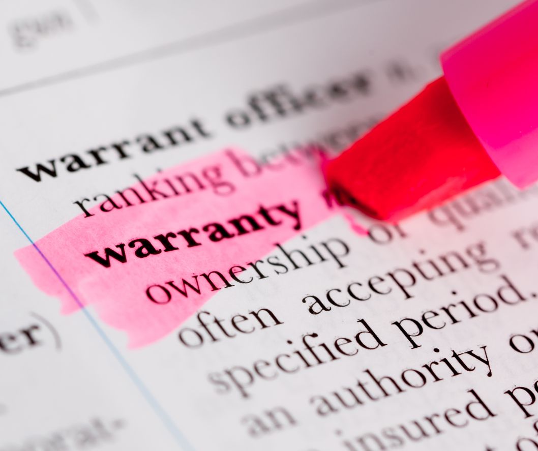 Appliance extended warranty highlighting warranty in the dictionary.