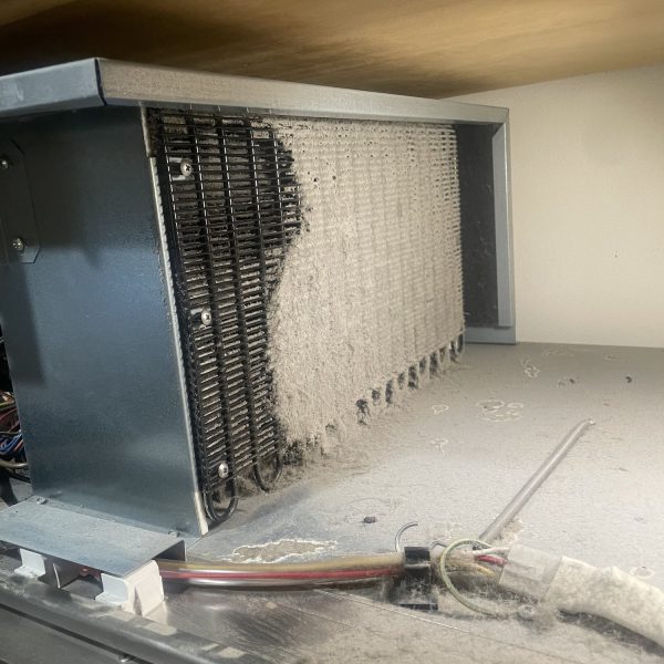 Refrigerator Repair Subzero Fridge condenser coil cleaning, and ice door chute replacement