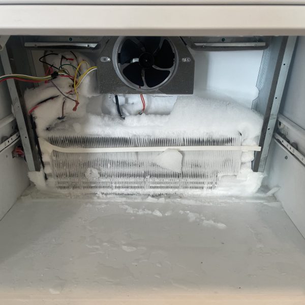 Refrigerator Repair Viking fridge replacing door skins to stainless and defrosting freezer 